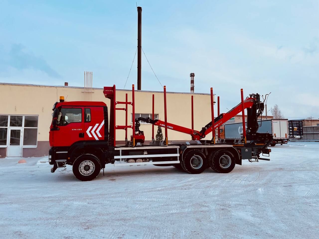 Лесовоз Sitrak C7H 6х4 с КМУ Велмаш ВМ10-86